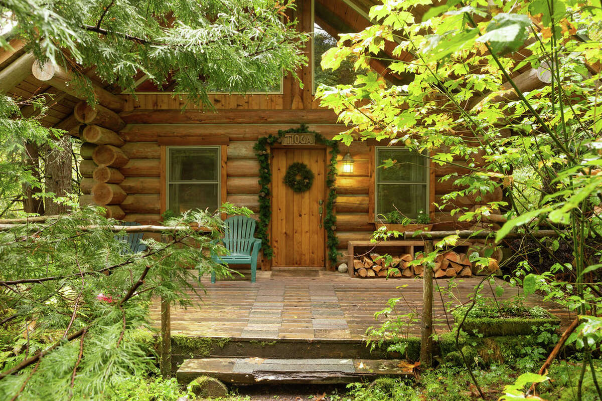 Just under two hours southeast of Seattle rests Wellspring Spa and Woodland Retreat. Encompassed by tall woodland greenery, the rustic yet chic spa resort is less than four miles from the Nisqually Entrance to Mount Rainier National Park. Cozy cabin rooms boast full kitchens, and some even host river rock fireplaces, jacuzzis and hammocks. The property also features a treehouse for two, and a full lodge which can house up to 14 guests.  Leisurely lay back, cozy up and enjoy spa treatments, nearby hiking trails and bubbly hot tubs. 