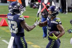 Seahawks rally against 49ers, locked into third seed of NFC